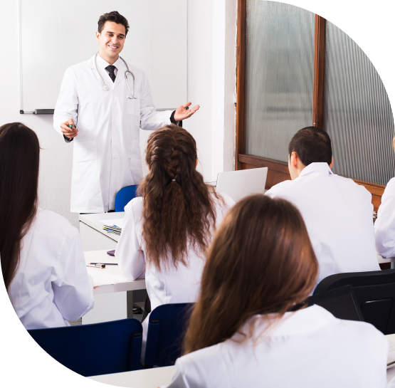 Doctor presenting to a room of medical professionals