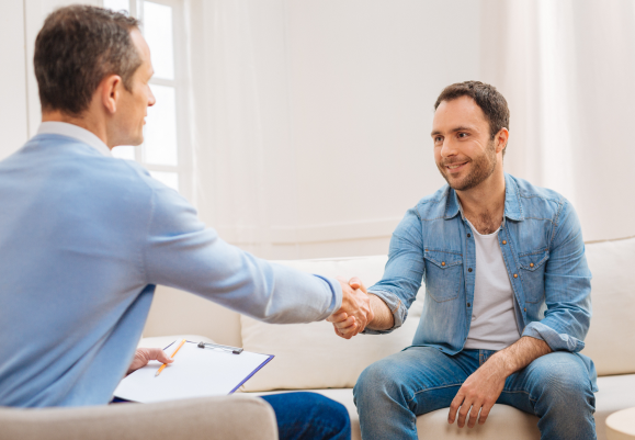 two men shaking hands