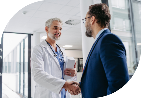 doctor and man shaking hands